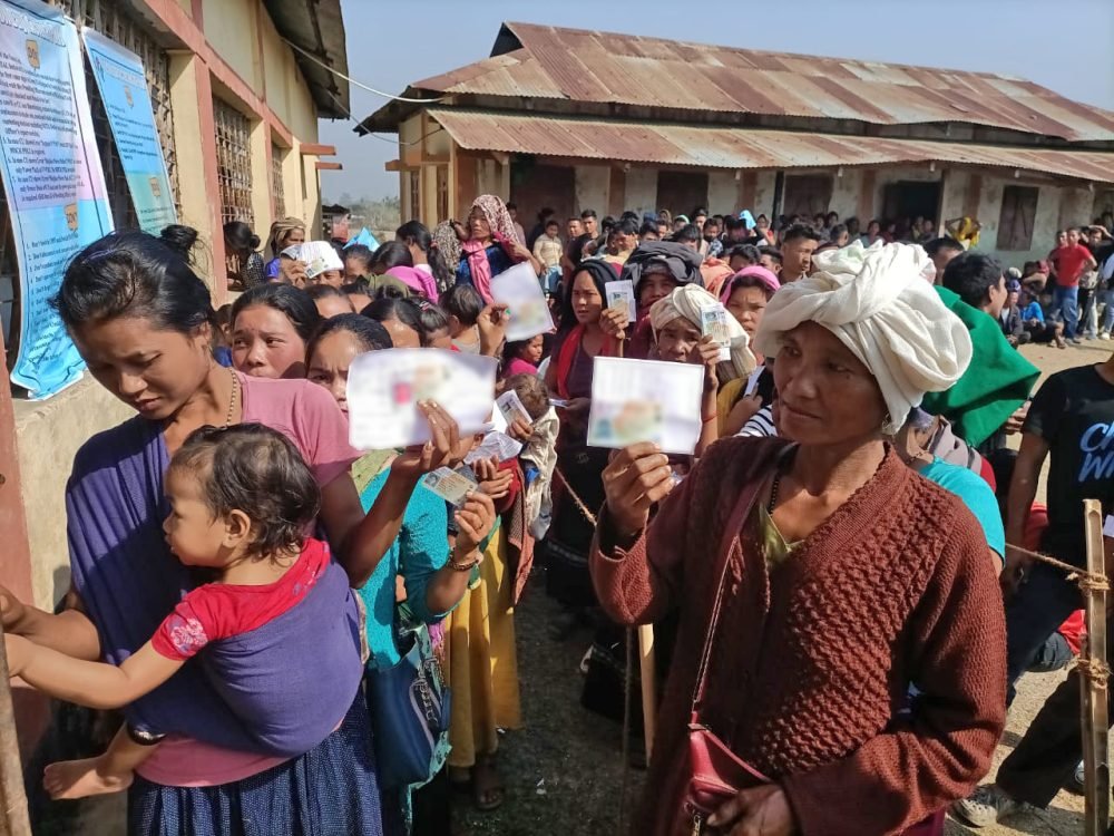 Tripura, Feb 16 (ANI): Bru Migrants wait in the queue to cast their vote for the Tripura Assembly Elections 2023, at the polling booth on Thursday. (ANI Photo)