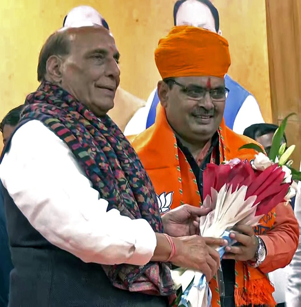 Jaipur, Dec 12 (ANI): Rajasthan Bharatiya Janata Party (BJP) central observer Rajnath Singh congratulates party MLA Bhajan Lal Sharma for being appointed as the Chief Minister of the State, in Jaipur on Tuesday. (ANI Photo)