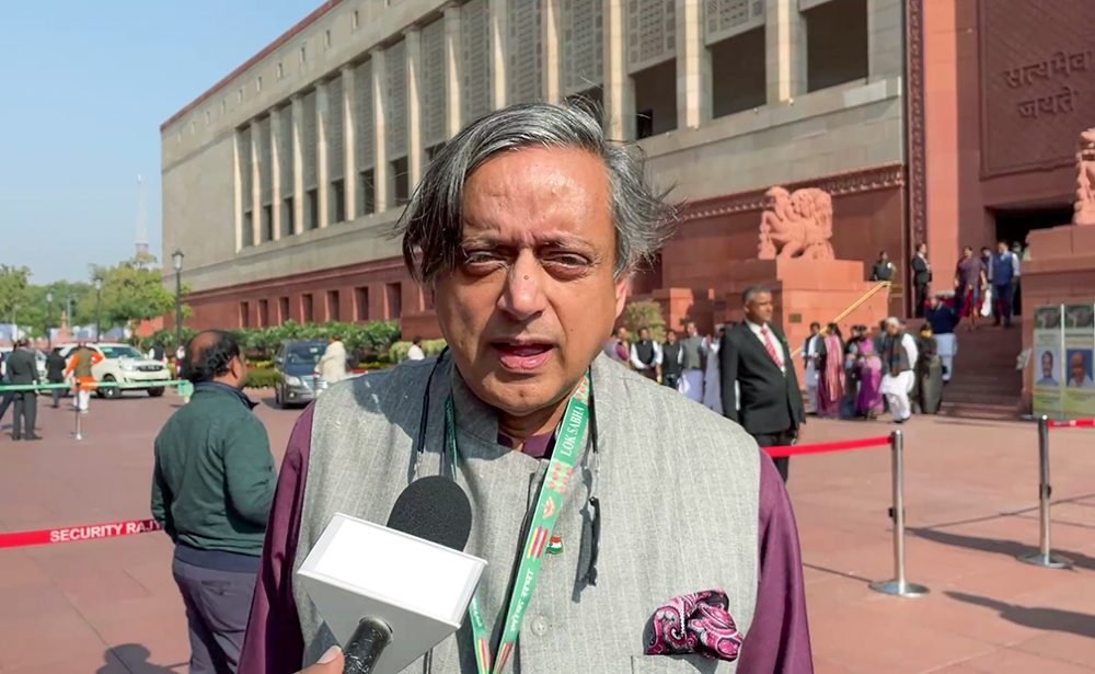 New Delhi, Dec 19 (ANI): Congress MP Shashi Tharoor speaks to the media regarding the suspension of more than 40 MPs from Lok Sabha, including his own, for the remainder of the Winter Session of Parliament, at the Parliament premises, in New Delhi on Tuesday. (ANI Photo)