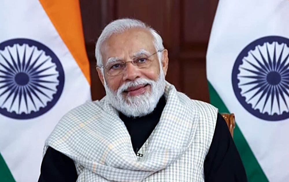 New Delhi, Dec 27 (ANI): Prime Minister Narendra Modi attends the virtual interaction with the beneficiaries of the Viksit Bharat Sankalp Yatra, in New Delhi on Wednesday. (ANI Photo)