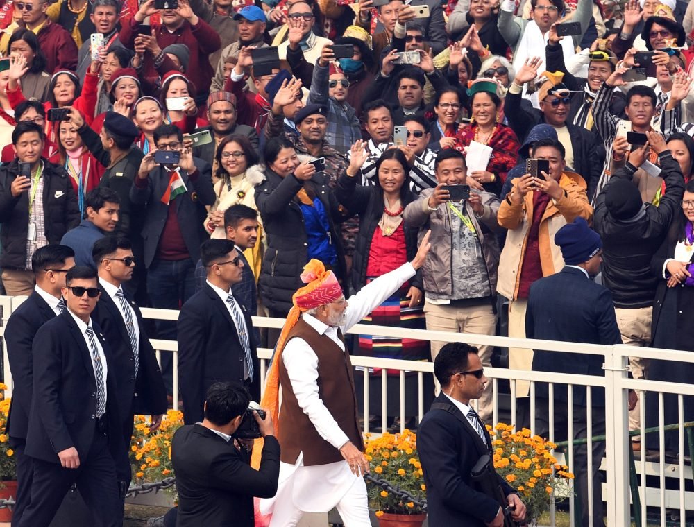 New Delhi, Jan 26 (ANI): Prime Minister Narendra Modi greets the spectators during the 75th Republic Day celebrations, at the Kartavya Path, in New Delhi on Friday. (ANI Photo)
