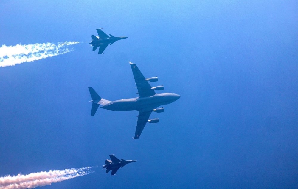 New Delhi, Jan 26 (ANI): The Indian Air Force (IAF) C-17 Globemaster III transport aircraft and two Sukhoi Su-30MKI fighter jets fly past during the 75th Republic Day celebrations, at the Kartavya Path in New Delhi on Friday. (ANI Photo/Rahul Singh)