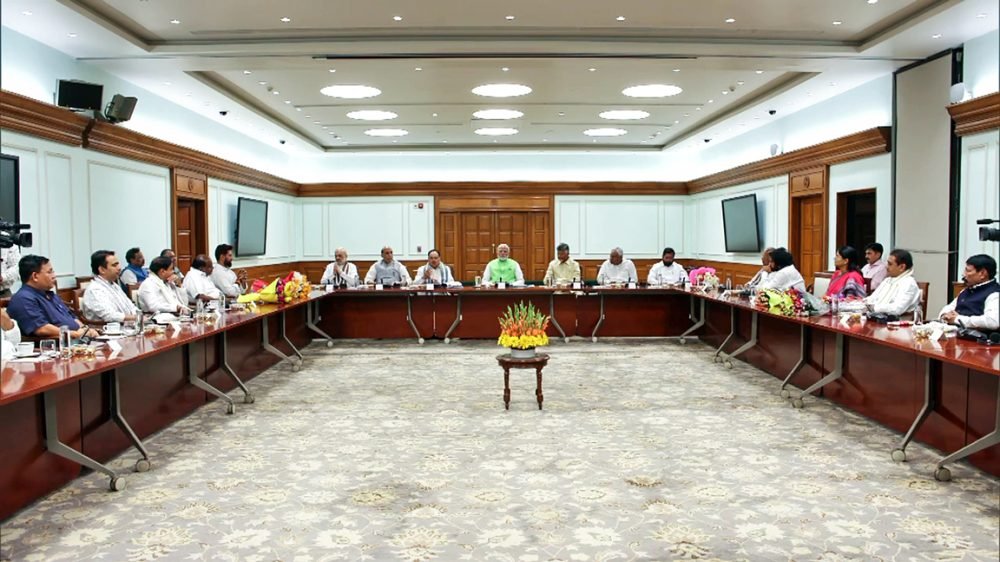 Prime Minister Narendra Modi with leaders during the NDA leaders meeting after the Lok Sabha election results, at his 7, LKM, residence in New Delhi on Wednesday